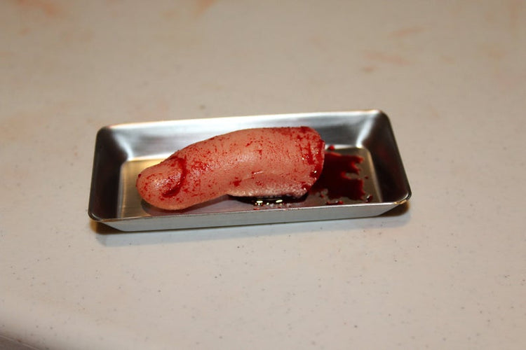 Severed Finger Prop on Medical Metal Tray