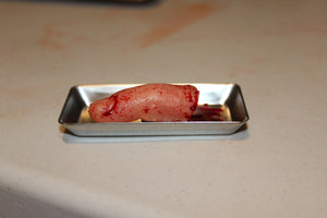 Severed Finger Prop on Medical Metal Tray