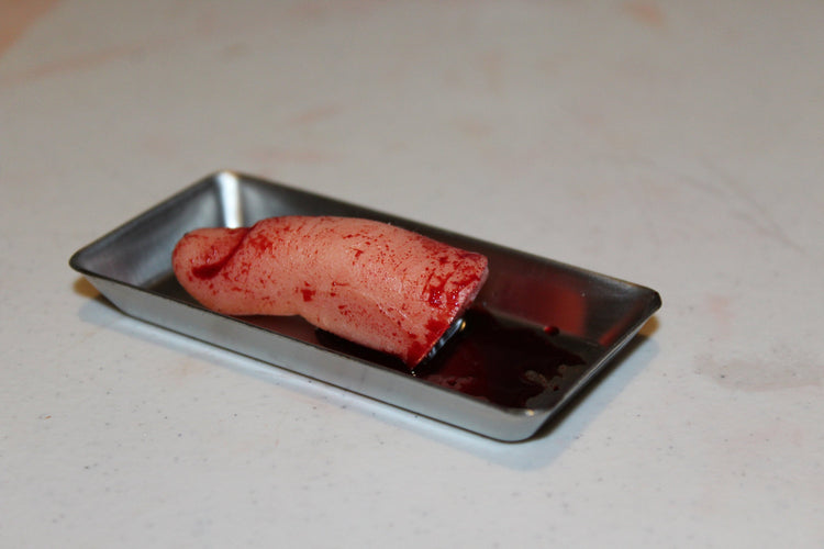 Severed Finger Prop on Medical Metal Tray